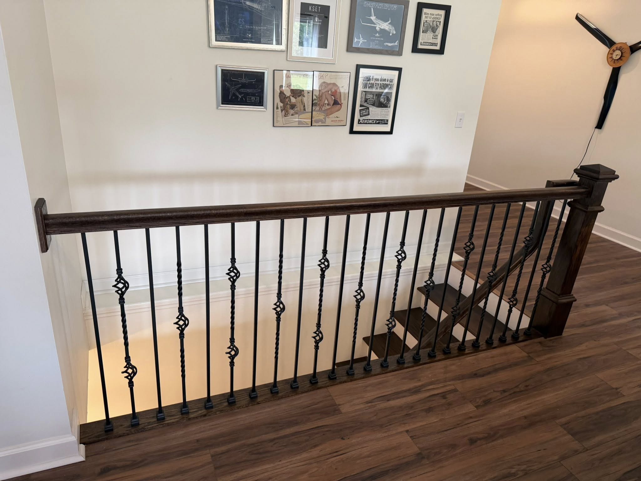 Custom oak newel post and rails matching the new staircase build